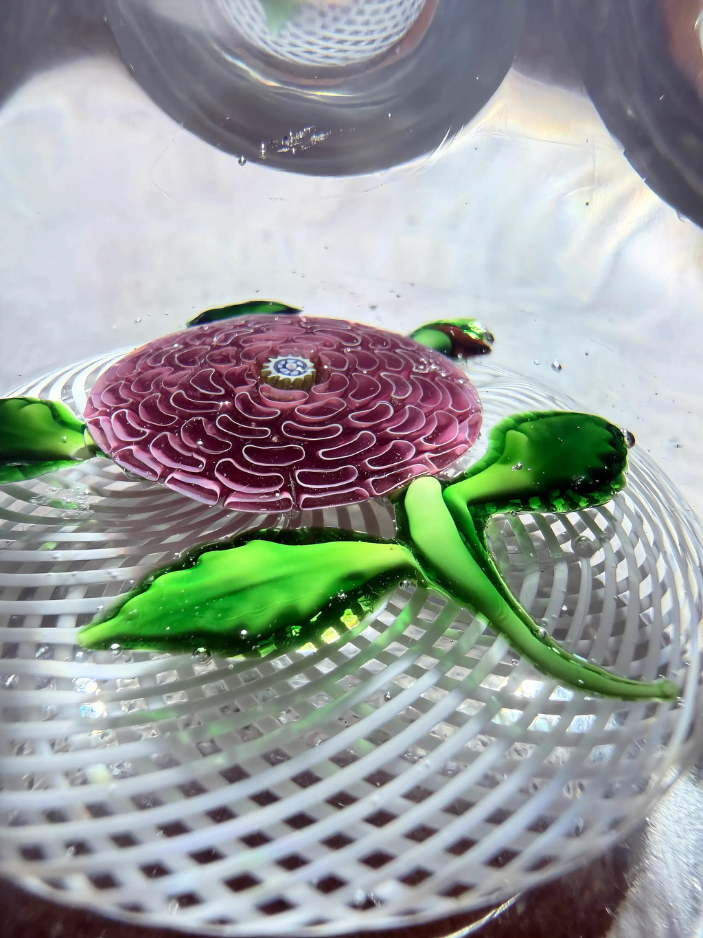 Wonderful mid-1800's faceted lampwork pink pompon with rows of C shaped petals atop a swirled latticinio basket, 4 leaves, curved stem and a red bud complete this 6 side faceted beauty. Top is domed, polished concave base. normal wear-basal ring around base, otherwise in excellent condition. Rare 3" large size!