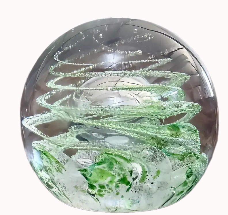 Made by Peter Holmes in 2025, Cosmic Dust has swirls of cosmic dust wrapping around a rising bubble. UV/sunlight reactant. Cosmic Dust is an unlimited edition piece at Holmes Glass. 3.7"