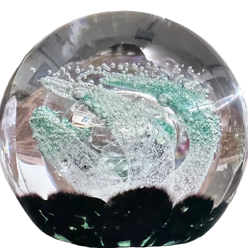 Made by Peter Holmes in 2025, Rhapsody Reflection-purple fronds are reflected in the mirror image of the silver bubble. UV reactant/glows after exposed to sunlight as well. A completely different experience under UV. This is number 2 in an edition of 5. 3.4"