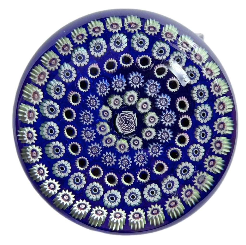 Deacons Glass 5 concentric rows of tight and crisp millefiori surrounding a a center Clichy style rose a top a translucent cobalt ground. Lovely weight. 2.80"