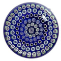 Deacons Glass 5 concentric rows of tight and crisp millefiori surrounding a a center Clichy style rose a top a translucent cobalt ground. Lovely weight. 2.80"