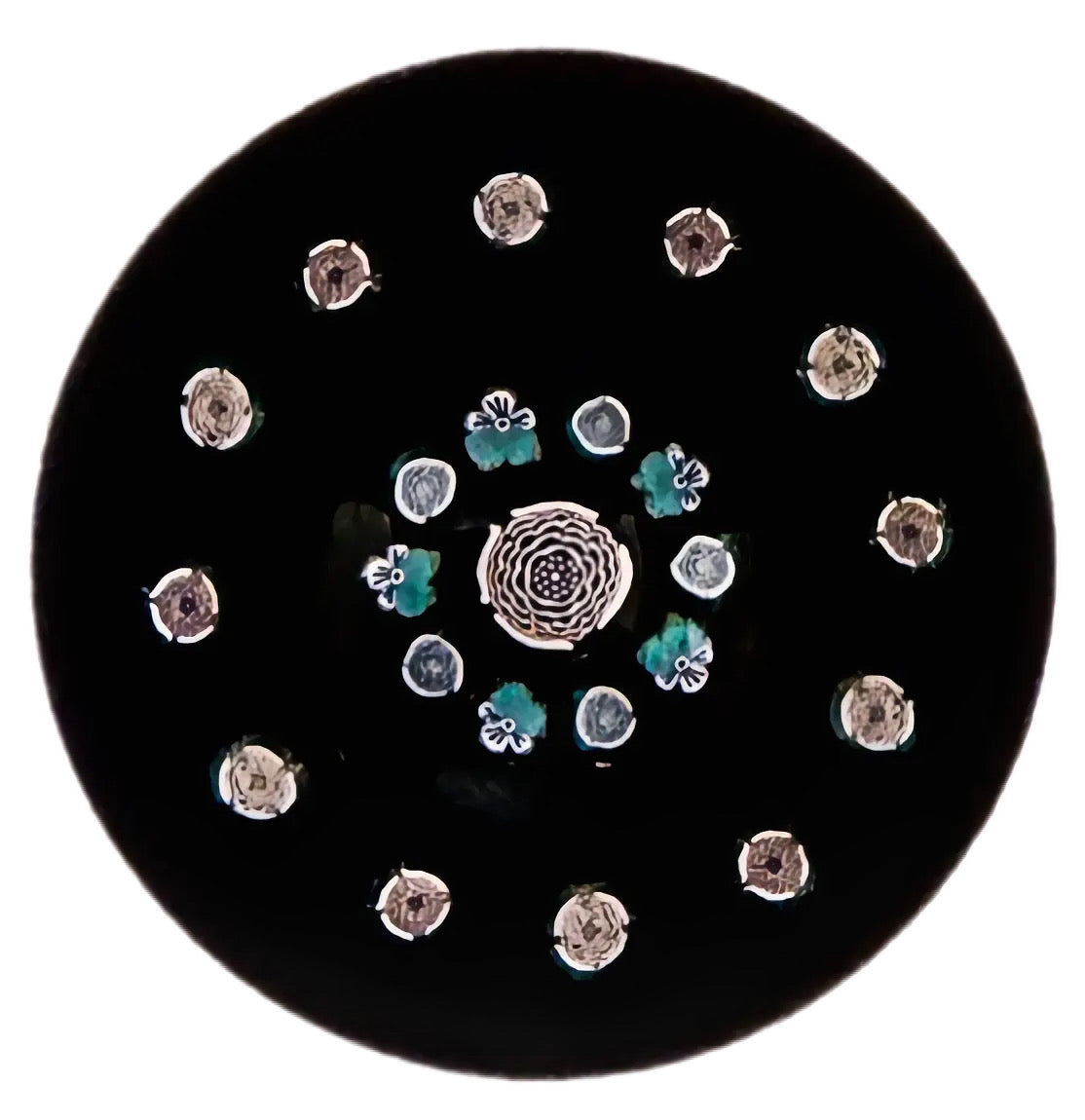 John Deacons medium concentric paperweight with a a Clichy rose style center cane surrounded by a concentric ring of alternating Clichy style rose canes and unique flower canes. The outermost ring is a garland of Clichy style roses, bringing the total to 18 Clichy style roses. Motif sits atop a dark purple opaque ground. JMD 2008 with heart outline signature cane on base. 2.9”