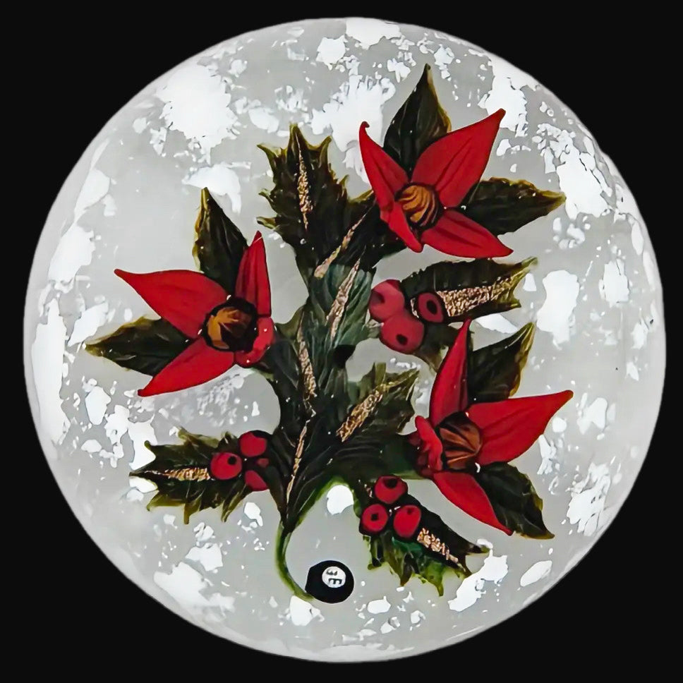 Limited Edition Holiday Weights by William Manson

3 Beautiful holiday red poinsettias with aventurine stems and leaves, 9 holly berries atop a clear ground with patches of ‘snow’. WM signature cane at base of stem, scratch signed and dated, each edition numbered accordingly. This piece is #4 of 10. Send me a message to see the remaining editions of this series. 3”