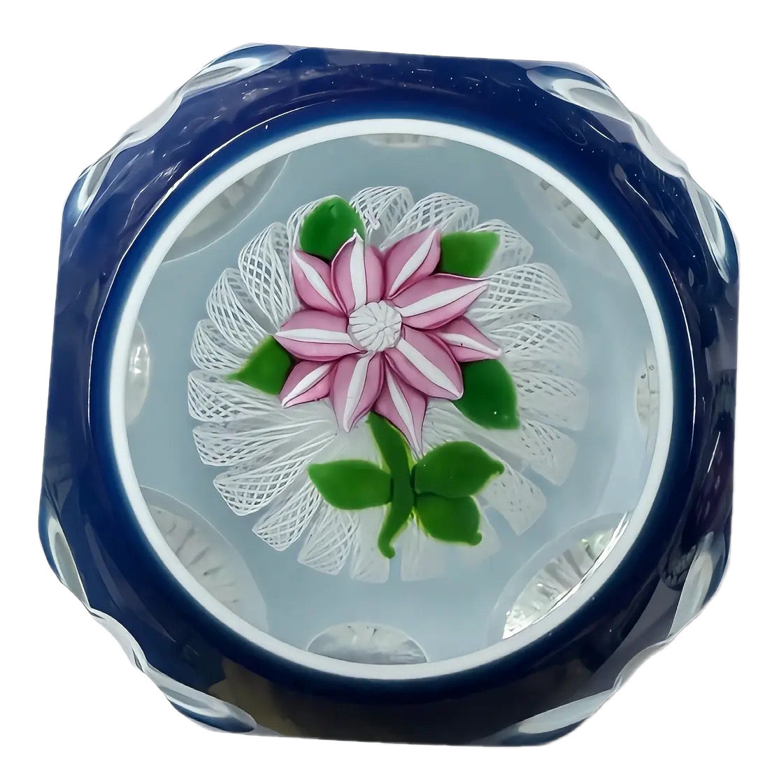 2000 John Deacons Encased Double Overlay-a breathtaking paperweight. A pink and white striped double clematis with stardust center cane sits atop a latticinio crown which is then encased in clear glass and dipped into two different shades of blue. The side facets are cut in an alternating pattern of circles and snowflakes?, which is a unique shape when it comes to this craft.&nbsp; This is a centerpiece for any Scottish Paperweight collector. 3"